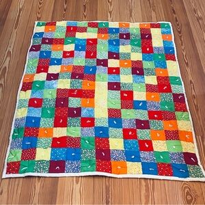 Handcrafted Colorful Baby Quilt – 48x35”
Brighten up any nursery cozy
